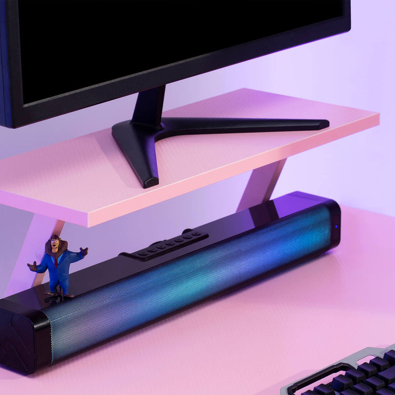 pink desk with monitor stand
